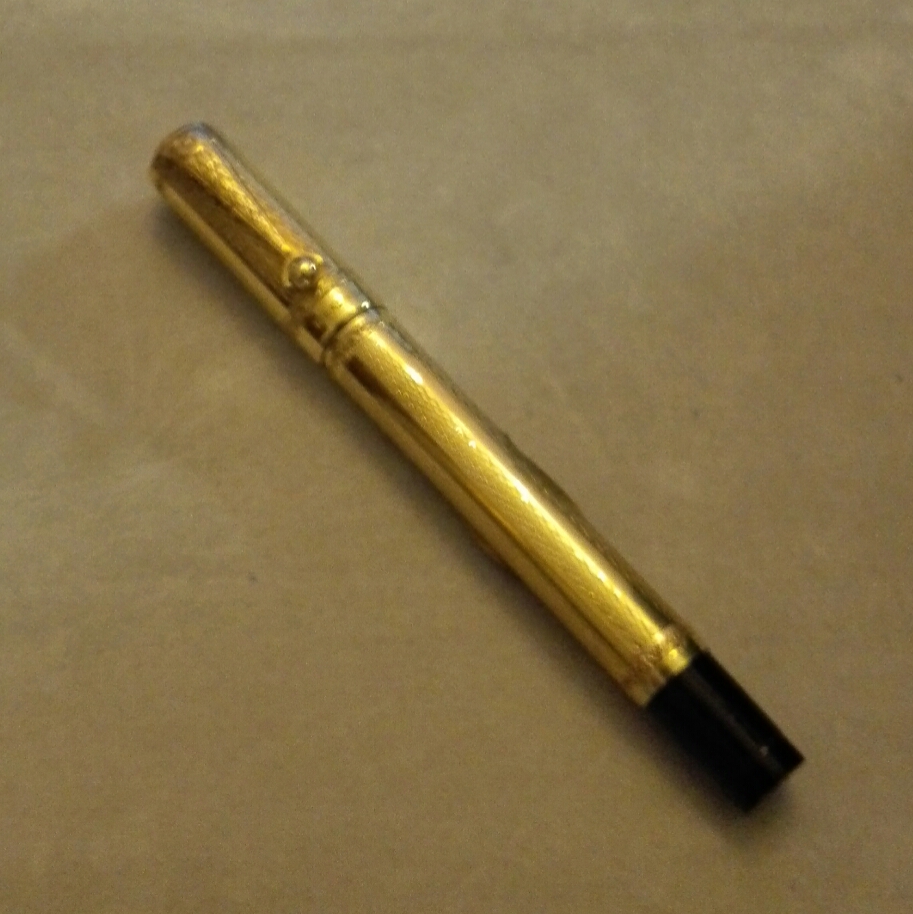 Penna stilografica in oro KR antica retrattile